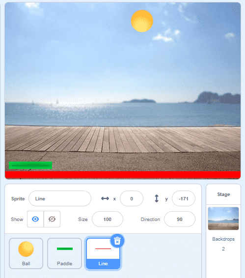 Now drag the red line sprite to the bottom of the screen